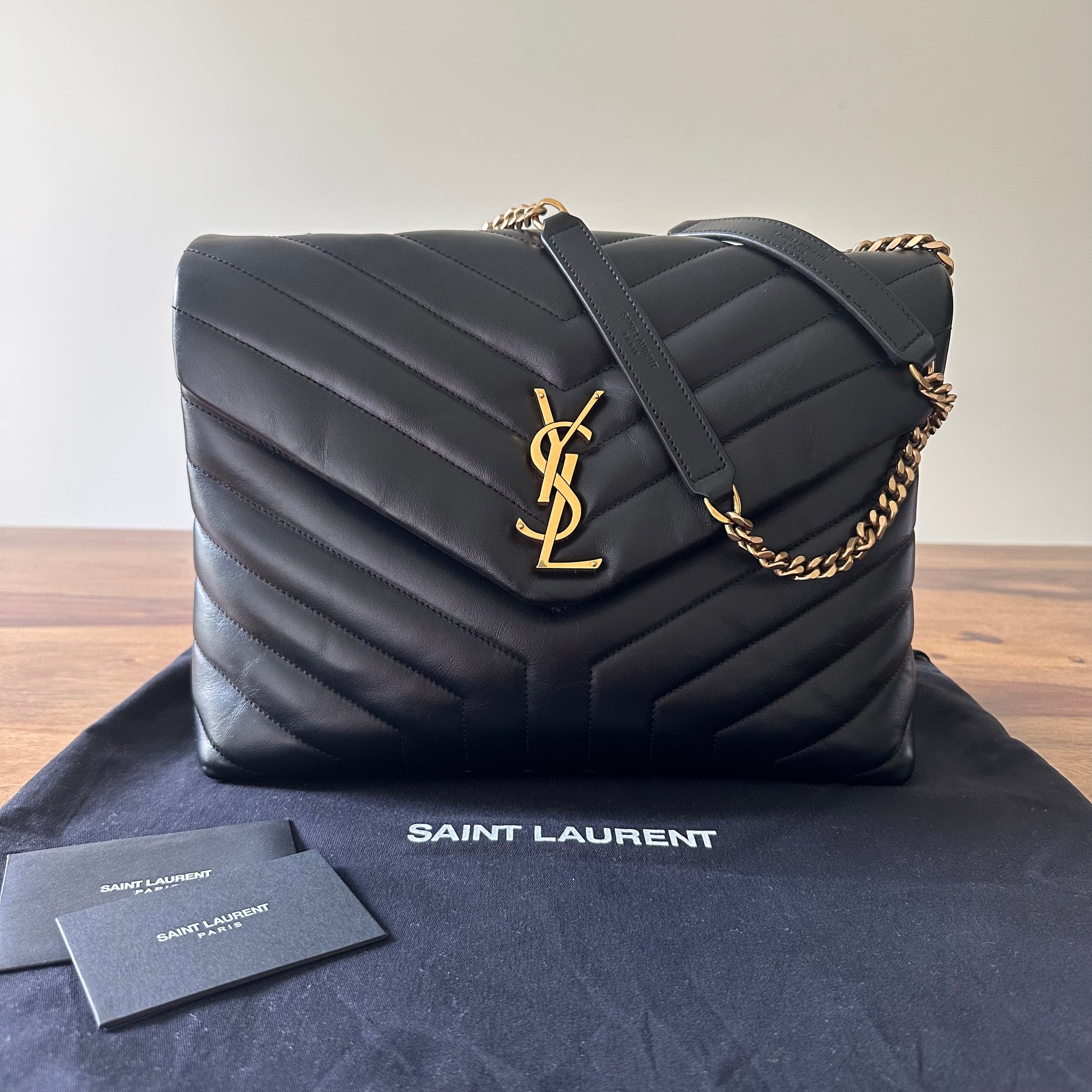 Saint laurent medium monogram matelassé leather wristlet hot sale