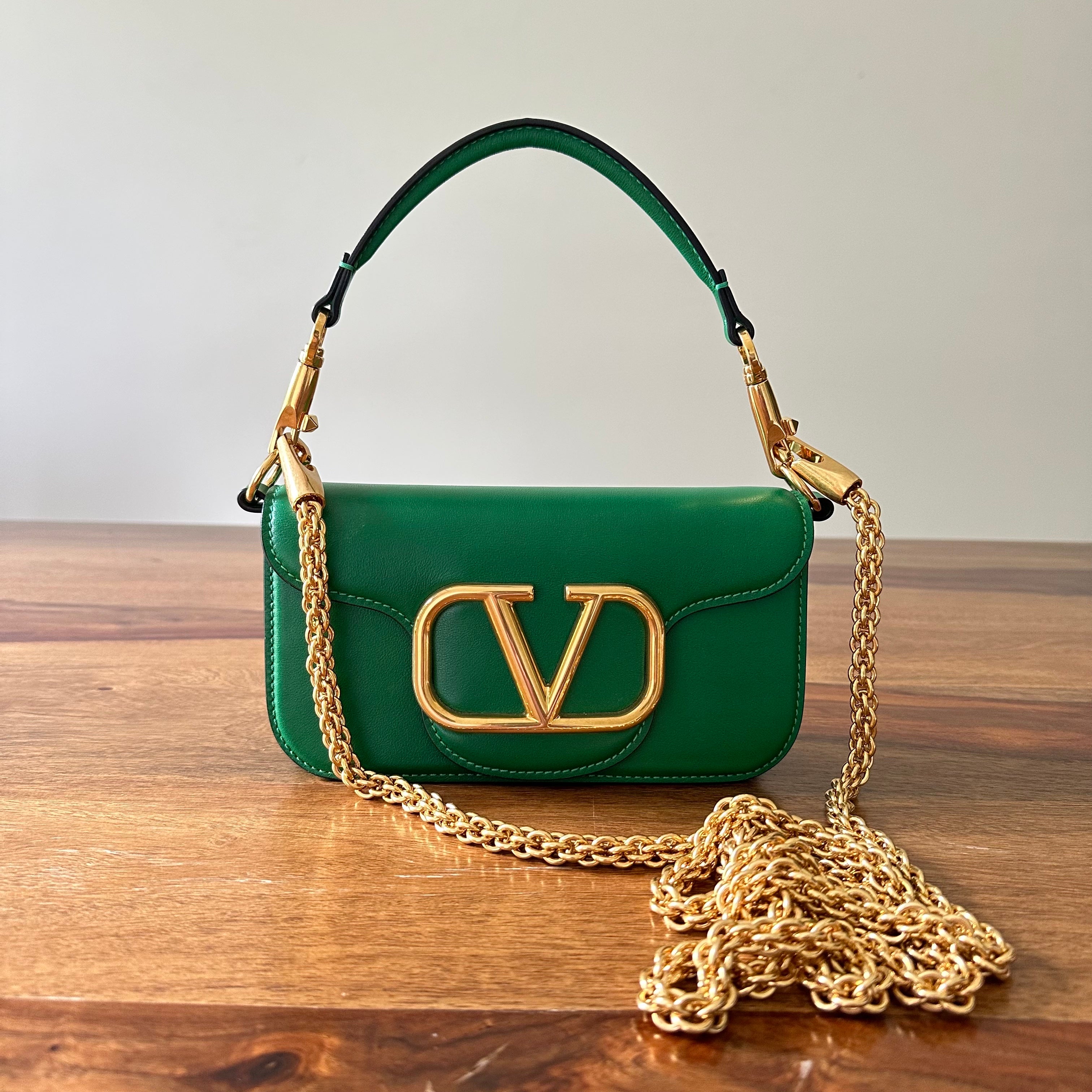 Small Vsling Grainy Calfskin Handbag for Woman in Black | Valentino BG